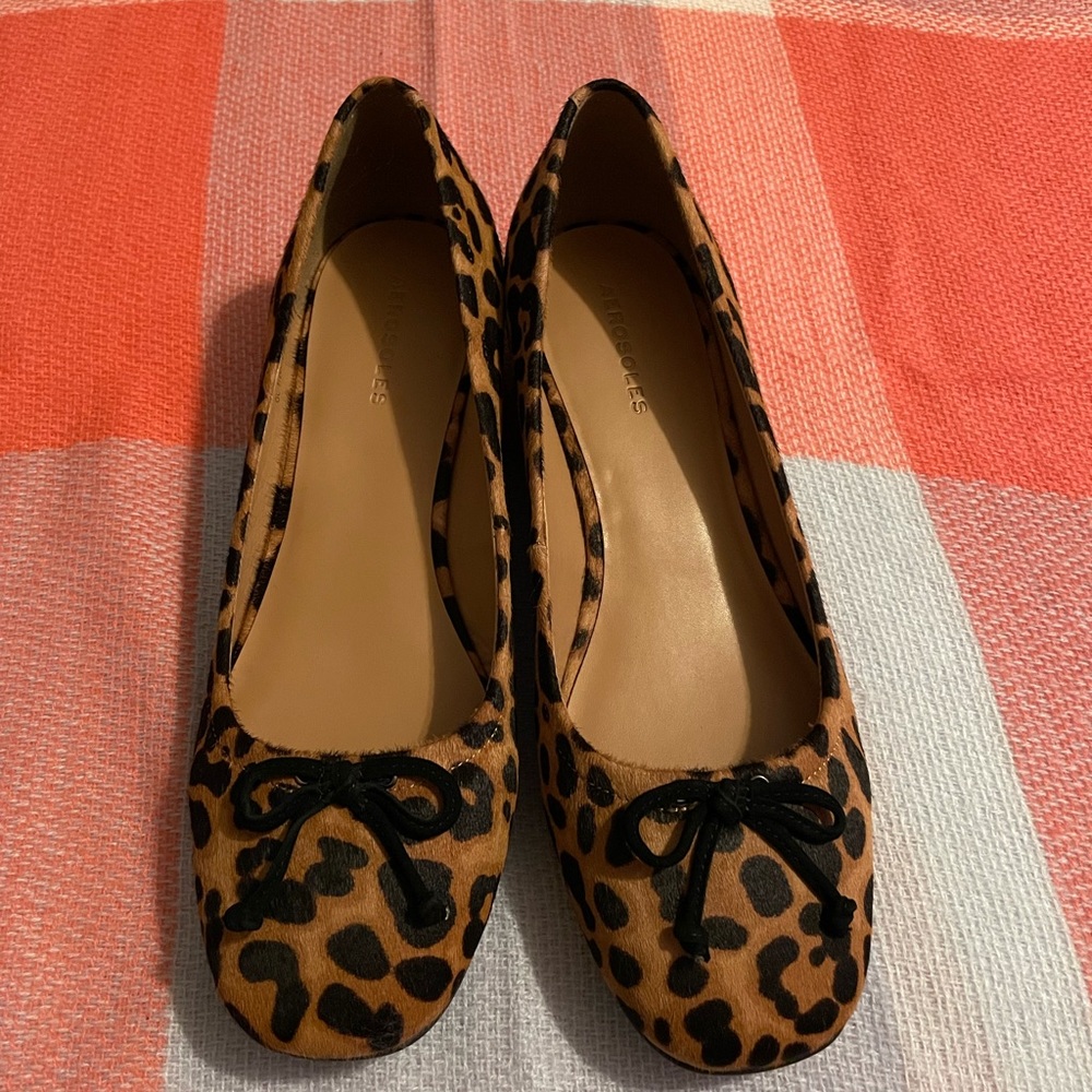 New in box. Worn once, true to size 10. Very cute on, I  ordered too big.